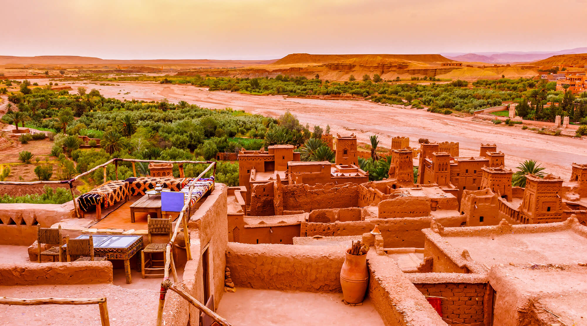 Beautiful Moroccan landscape with traditional architecture and palm trees